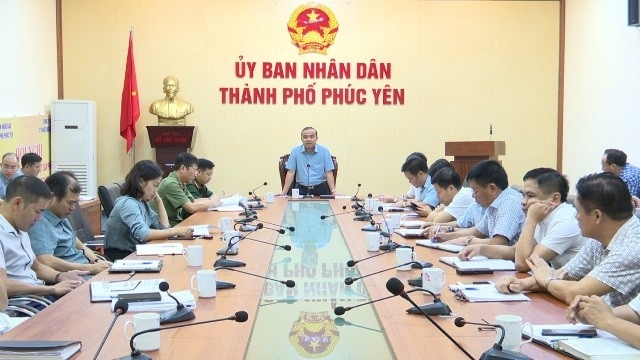 Đồng chí Phan Tiến Dũng (ảnh trên đứng) - Phó Bí thư Thành ủy, Chủ tịch UBND thành phố 