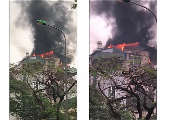 cuu 9 nguoi dan thoat khoi dam chay tren pho lac trung