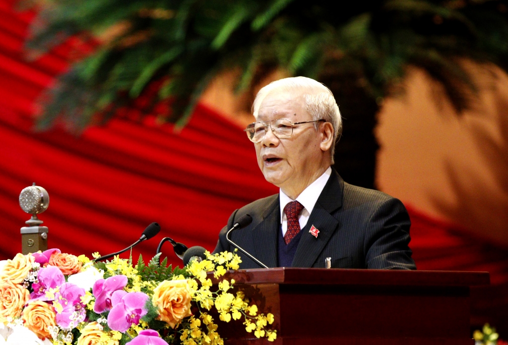 Tổng Bí thư, Chủ tịch nước Nguyễn Phú Trọng trình bày Báo cáo của Ban Chấp hành Trung ương Đảng khoá XII về các văn kiện trình Đại hội XIII của Đảng