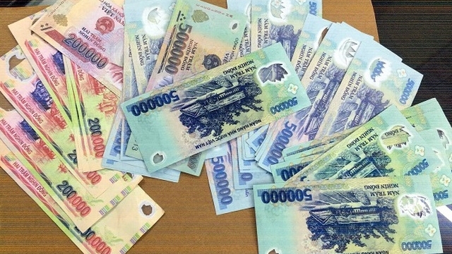 Cảnh giác thủ đoạn mua bán tiền giả trên mạng dịp Tết