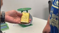 gia vang nong bong tay buon lau lai gia tang