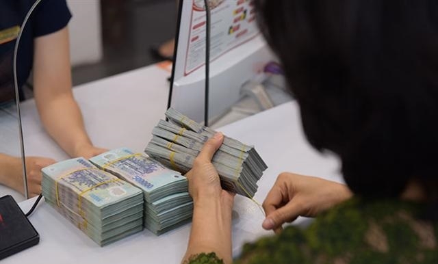 Ngân hàng gánh hậu quả do doanh nghiệp không trả được nợ vì Covid-19 ngan hang ganh hau qua do doanh nghiep khong tra duoc no vi covid 19