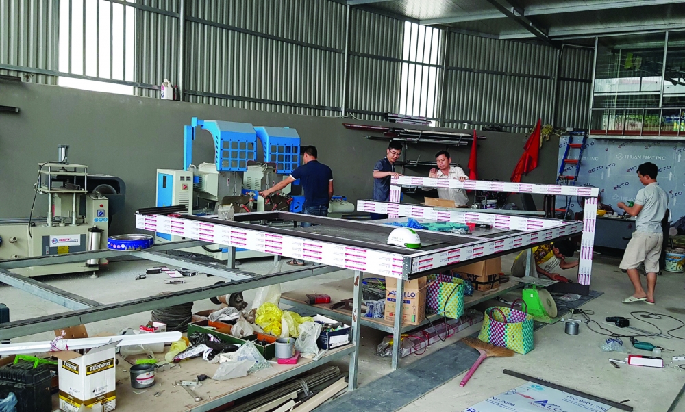 Xưởng sản xuất và gia công cửa của Công ty Cao Cường Xưởng sản xuất và gia công cửa của Công ty Cao Cường