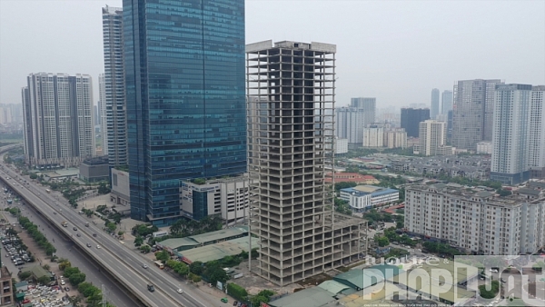 Cận cảnh trụ sở Vicem trên khu đất vàng đắp chiếu 8 năm tại thủ đô Hà Nội can canh tru so vicem tren khu dat vang dap chieu 8 nam