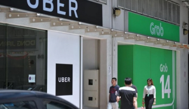 lap hoi dong xu ly vu grab mua uber vi pham luat canh tranh