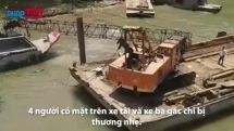 Cần cẩu gãy đôi khi nhấc xe tải khỏi mặt nước