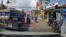 Tài xế xe tải đuổi theo chèn ép thanh niên đi xe máy